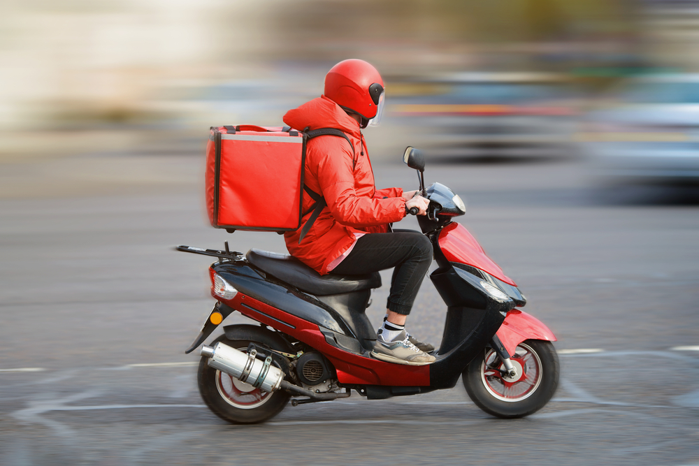 a rider on his way to deliver food