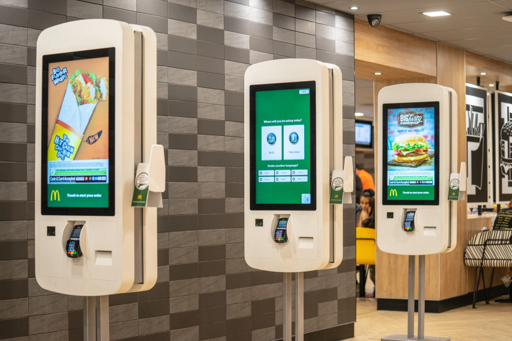 three digital kiosks